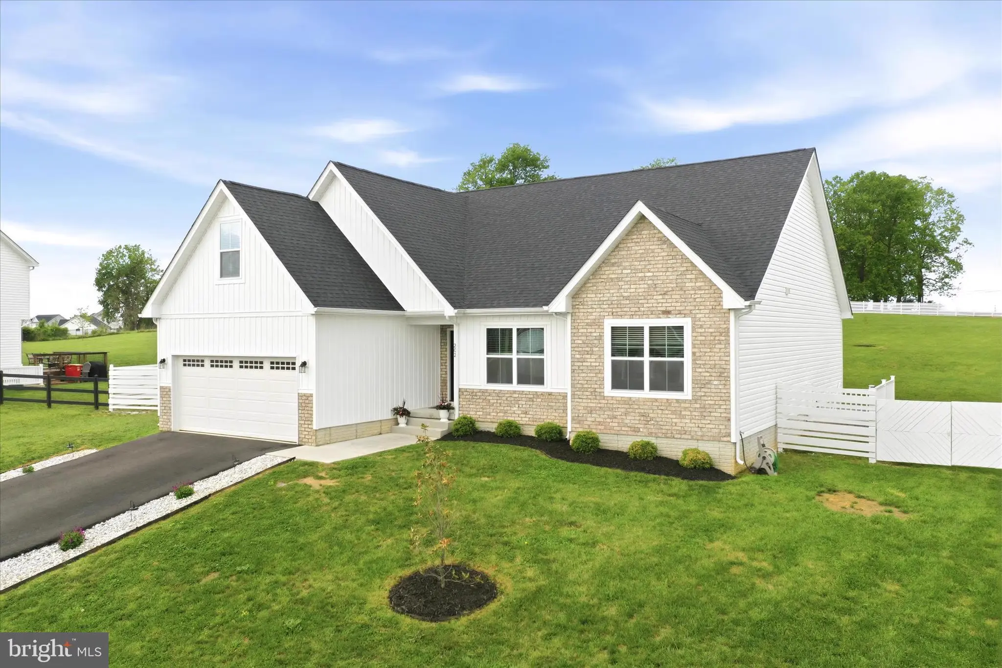 202 Naples Way front exterior, Charles Town WV 25414 — 4BR ranch home on 1.18 acres
